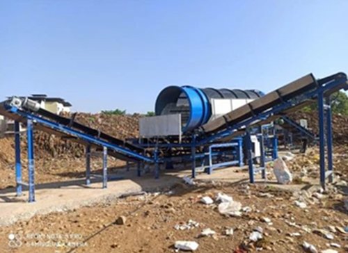 Steel-framed conveyor system installed across a quarry site